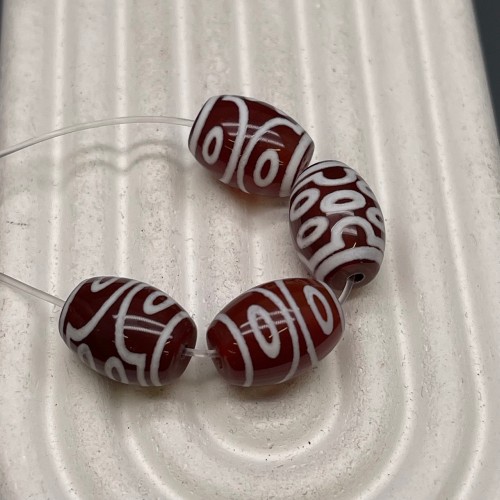 Бусина Дзи "700" из сердолика, 7 глаз, размер 12х9 мм