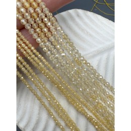 Каменные бусины, Цирконий кубический, (т.н. Циркон), кристалл, цвет "айвори" (слоновая кость), шарик огранка, 2 мм, длина нити 38 см