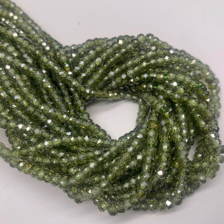 Каменные бусины, Цирконий кубический, (т.н. Циркон), зелёный кристалл, рондель, огранка, 3х2 мм, длина нити 38 см арт. 14713