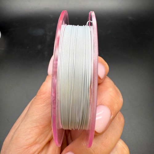 Тросик ювелирный SakuLux (Япония), 49 стальных струн, с силиконовым покрытием, цвет серебро, толщина 0,45 мм, 5 м в катушке