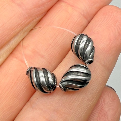 Бусина, разделитель витой, размер 10х7 мм, цена за 1 шт.