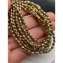 Каменные бусины, Гематит синтетический, бочонок, огранка, цвет золото, размер 5х3 мм, длина нити 35-36 см