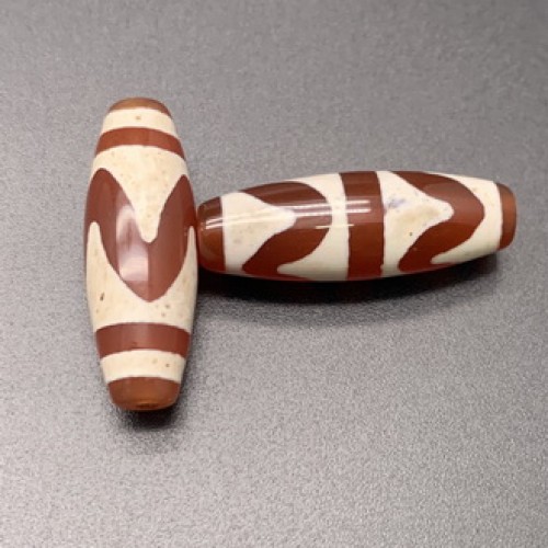 Бусина Дзи "126" из сердолика, Тассо лошадь, размер 30х10 мм, цена за 1 шт