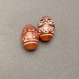 Бусина Дзи "712" из сердолика, 11 глаз, размер 12х9 мм