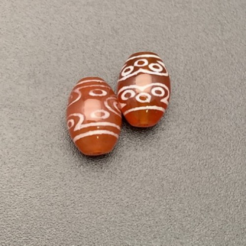 Бусина Дзи "712" из сердолика, 11 глаз, размер 12х9 мм