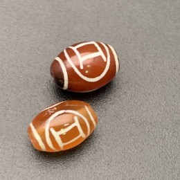 Бусина Дзи "674" из сердолика, Близнецы, размер 12х9 мм, цена за 1 шт