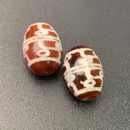 Бусина Дзи "707" из сердолика, 12 глаз, размер 12х9 мм