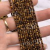 Каменные бусины, Тигровый Глаз, рондель огранка, 2х3 мм, длина нити 38 см