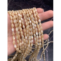 Каменные бусины, Перламутр бежевый, тонированный, рис, 3х5 мм, длина нити 38 см