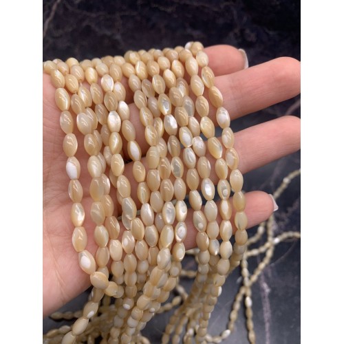 Каменные бусины, Перламутр бежевый, тонированный, рис, 3х5 мм, длина нити 38 см