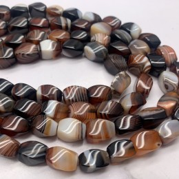 Каменные бусины, Сардоникс, темно-коричневый, крученый бочонок, 11,5 х 7,5, длина нити 38 см, 33 шт. на нити