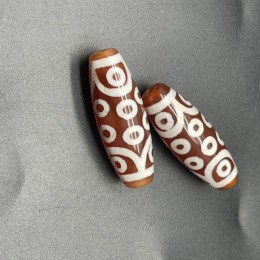 Бусина Дзи "91" из сердолика, 18 глаз, размер 30 х 10 мм